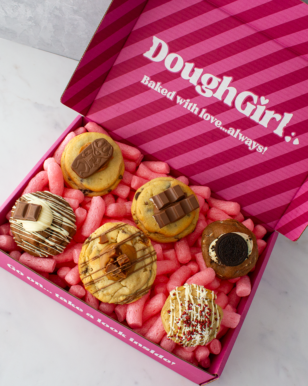 DoughGirl cookie gift box with assorted deluxe cookies in pink packaging