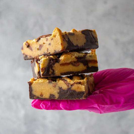 New cookie trend with DoughGirl stacked brownie layers held by hand