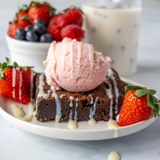 Serve brownies and slabs with ice cream, fresh fruits, and chocolate drizzel to  make the best DoughGirl Brownie dessert 