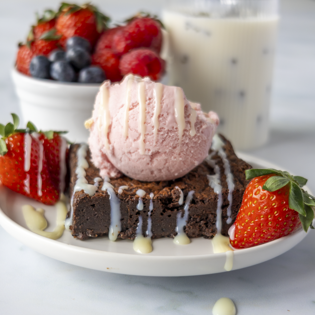 Serve brownies and slabs with ice cream, fresh fruits, and chocolate drizzel to  make the best DoughGirl Brownie dessert 