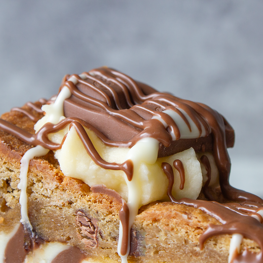 DoughGirl cookie pie stack with chocolate and white chocolate drizzle for Metro Store announcement