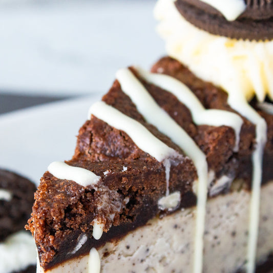 DoughGirl cookie pie close up with brownie pieces and white chocolate drizzle