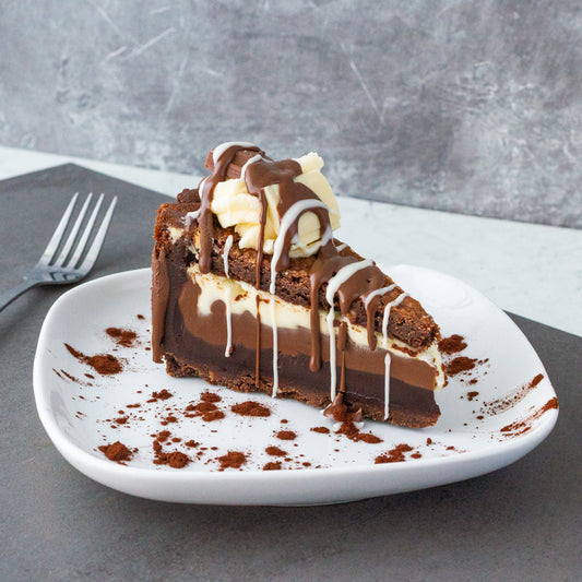 DoughGirl cookie pie slice with chocolate drizzle on a plate for storage guide