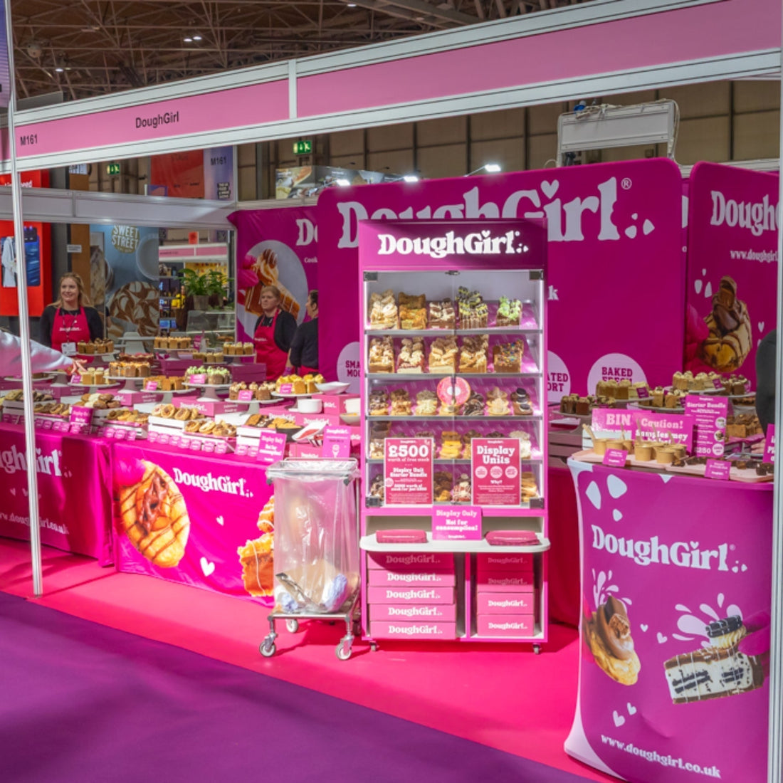 DoughGirl pink retail stand displaying cookies and cookie pies at a stockist