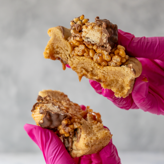 Stuffed cookie with Lion Bar pulled apart to reveal the chocolate filling