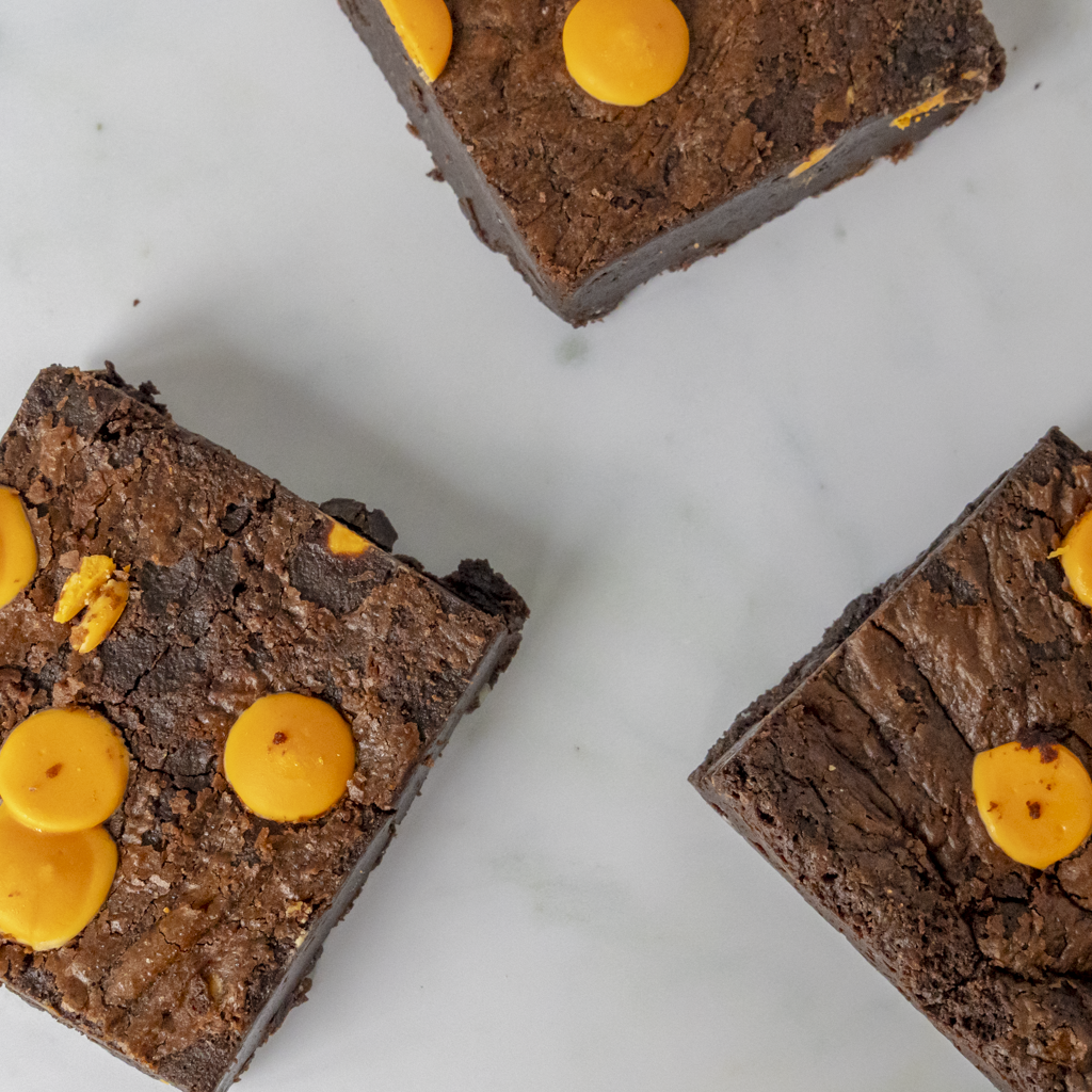 3 Chocolate Orange Brownie Slabs by DoughGirl UK on a white surface
