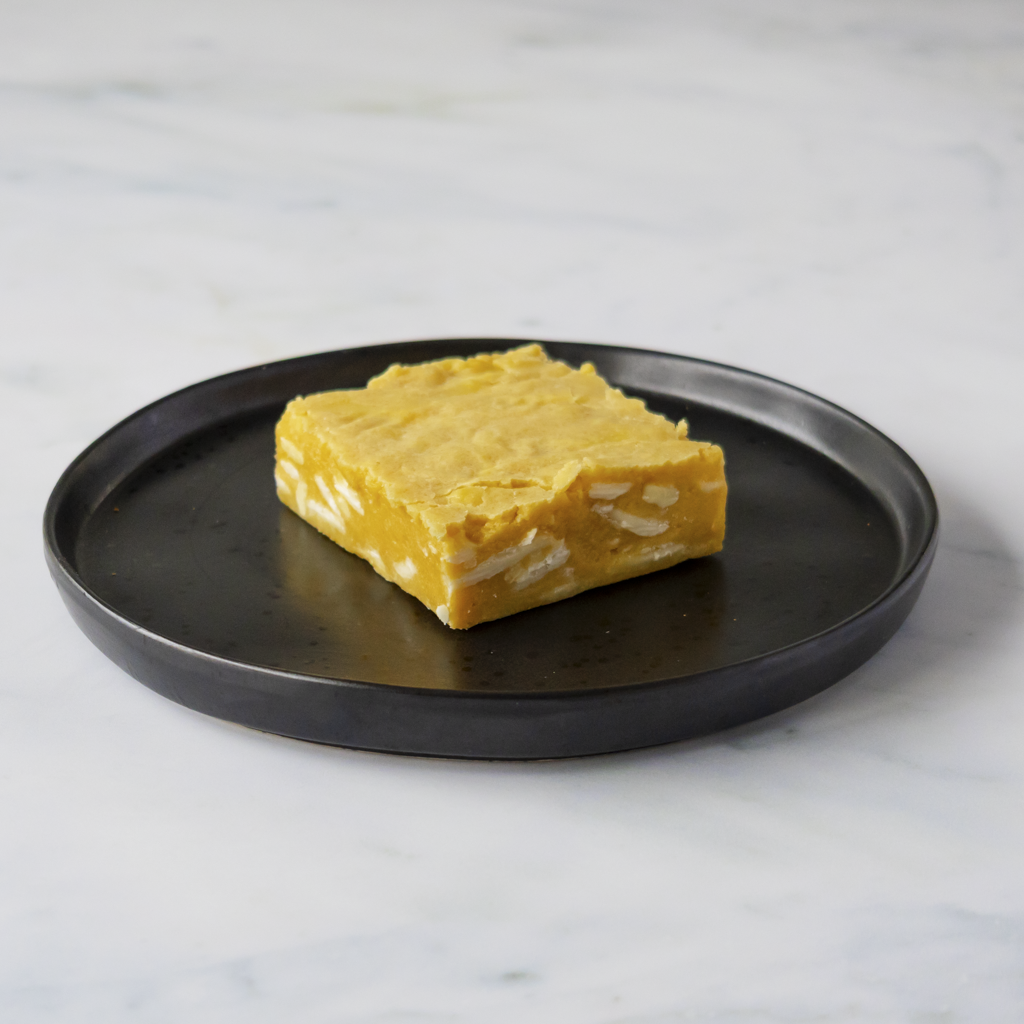 DoughGirl Classic Blondie Slab: thick bakery-style blondie delivers melt-in-the-mouth texture with every bite.