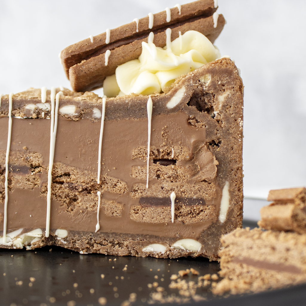 Close-up of DoughGirl Bourbon Biscuit Cookie Pie Slice with white chocolate drizzle