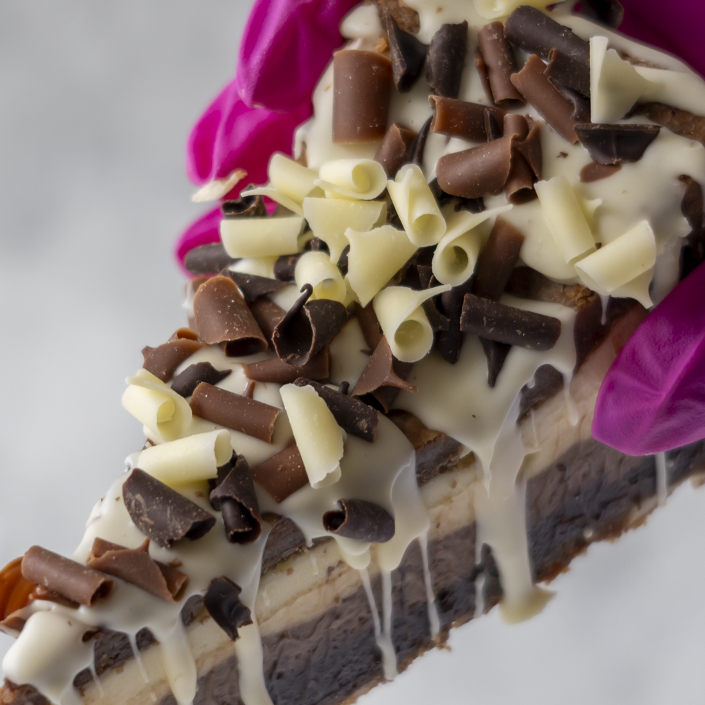 Close-up of DoughGirl Triple Chocolate Cookie Pie Slice with mixed chocolate topping