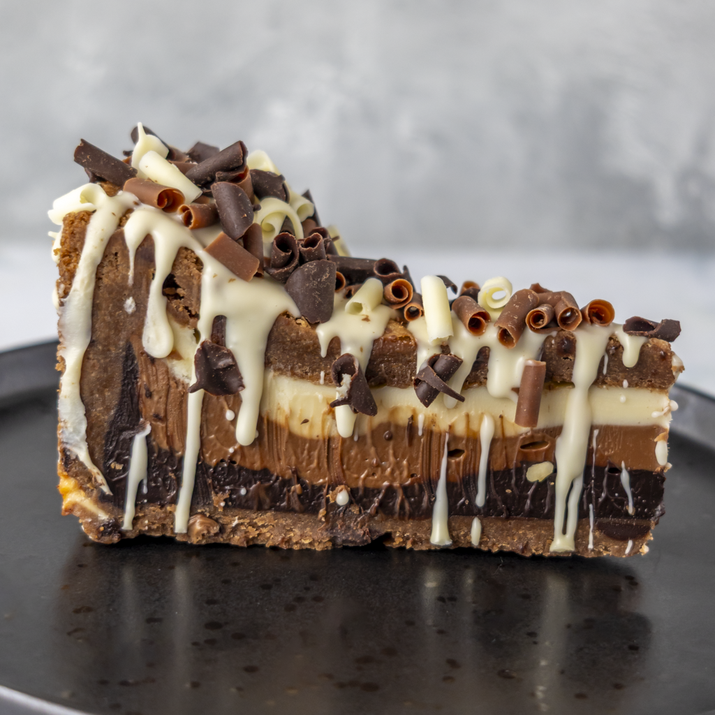 DoughGirl Triple Chocolate Cookie Pie Slice on black stand with layered chocolate filling