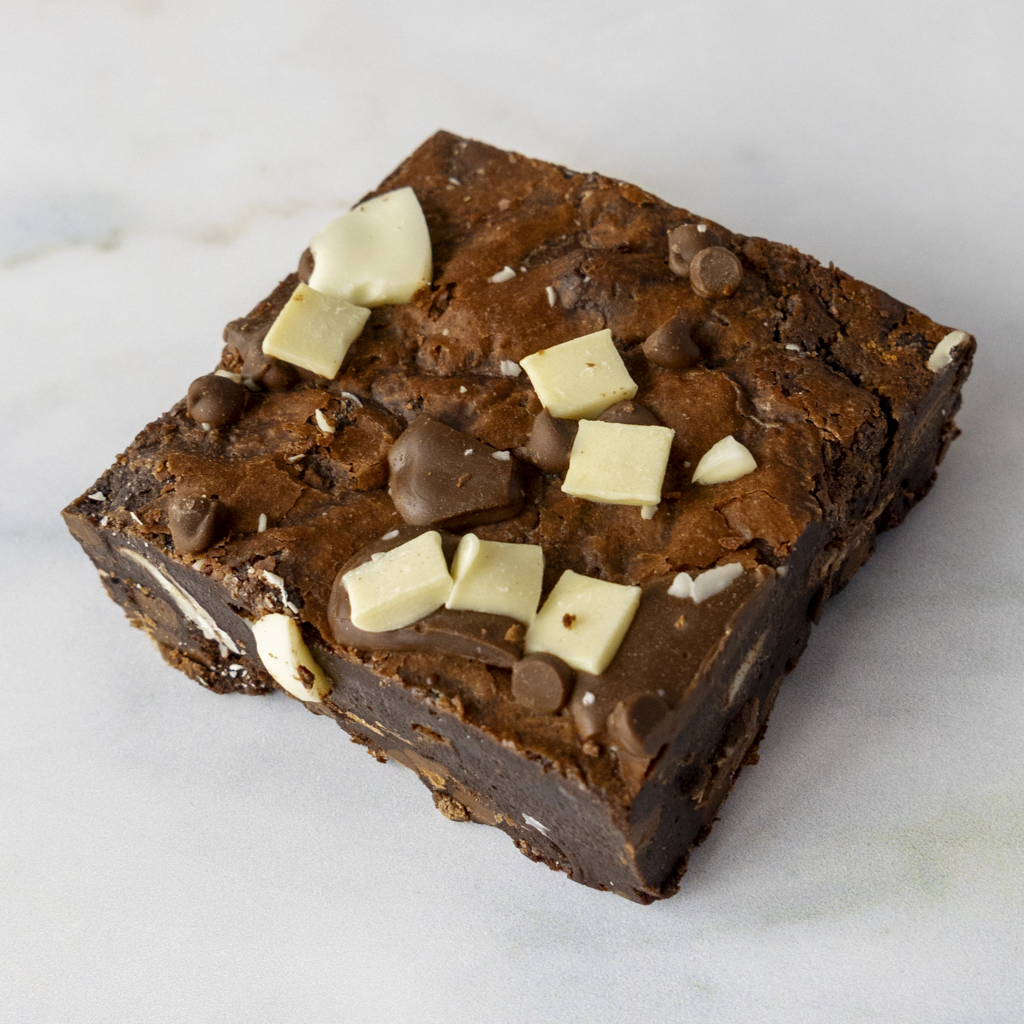 DoughGirl dessert - Triple Chocolate Brownie Slab - with premium chocolate chips on a white background