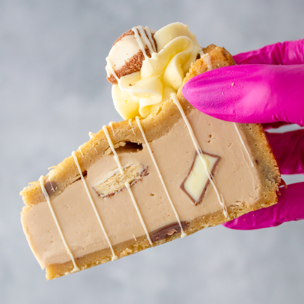 DoughGirl Cookie Pie Slice with Kinder Bueno White, buttercream and white chocolate drizzle