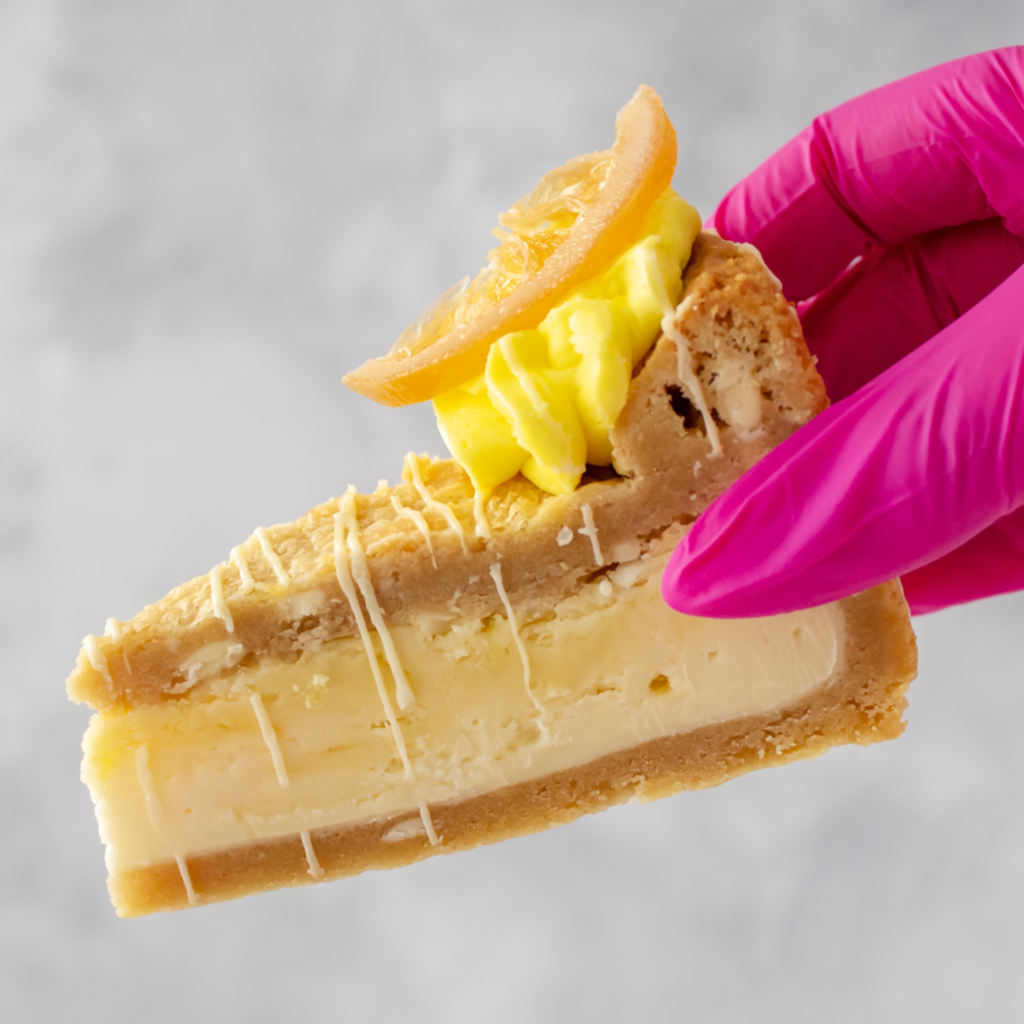 DoughGirl White Chocolate & Lemon Cookie Pie Slice with buttercream, jelly lemon and white chocolate drizzle