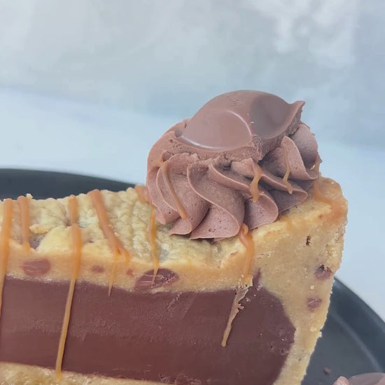 DoughGirl Caramel Cookie Pie, with caramel drizzle, on a black plate